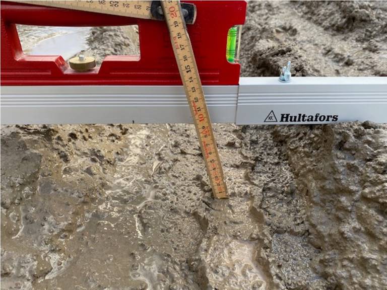 tumstock som visar 9 cm spårbildning